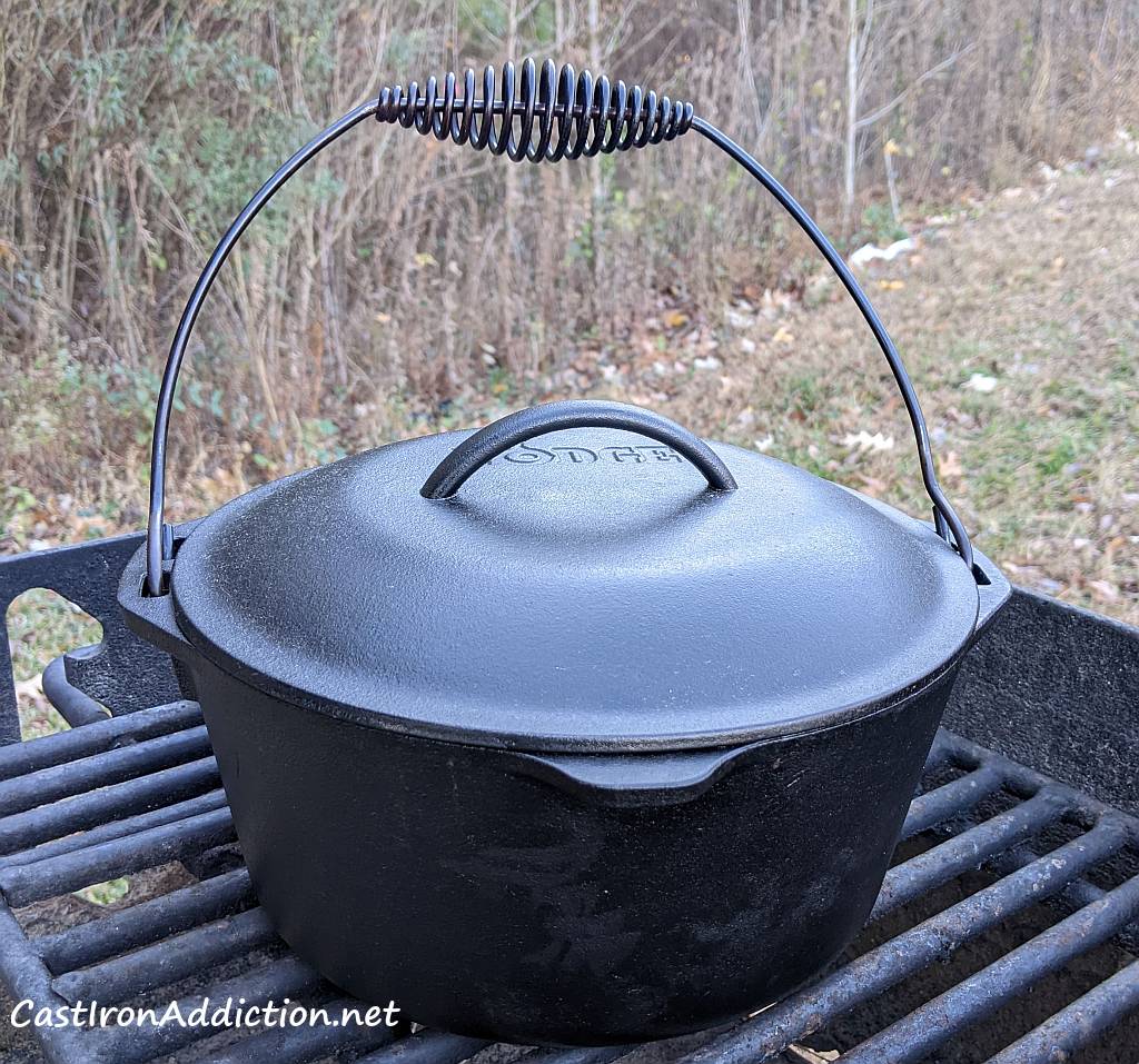 Lodge 5 quart dutch oven on the grill grate